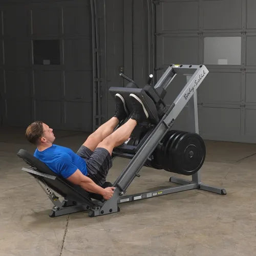 A man working out on a Leg extension machine in Saudi Arabia