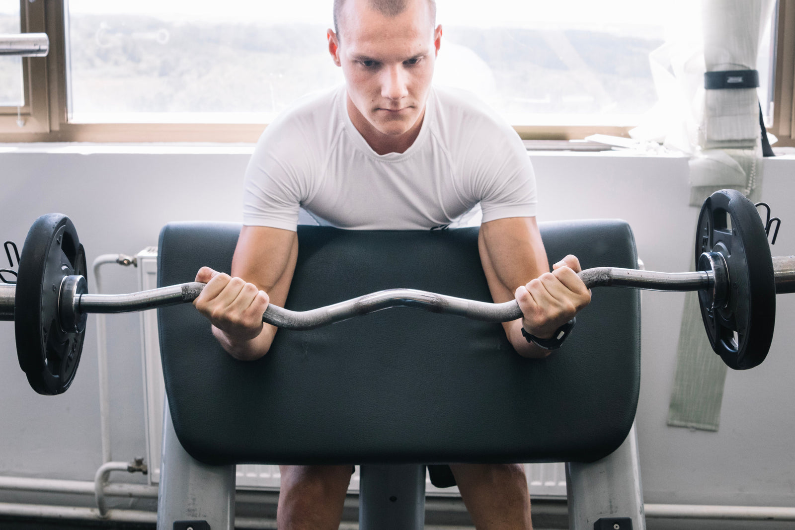 How Saudi Summers Inspired My Switch to a Home Gym with a Cross-Trainer and Olympic Bar